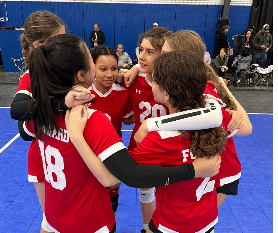 Forward Athletics Club Gilrs Volleyball Team in a Huddle Before a Volleyball Game