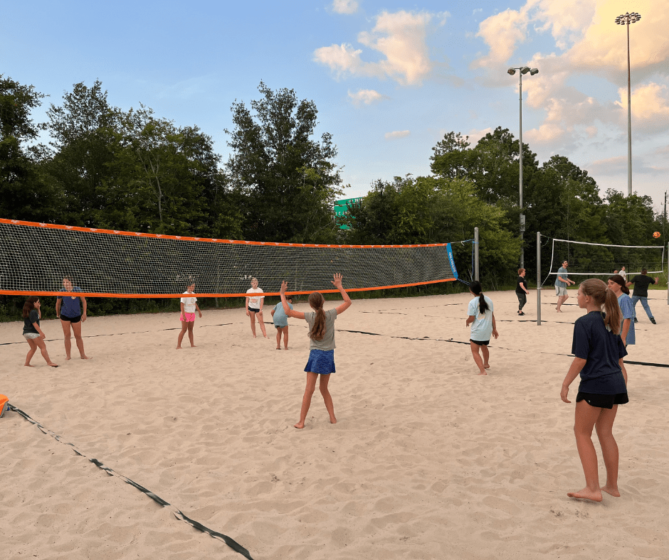 Forward Athletics Club Family Experience - Gilrs Volleyball Team Playing on a Sand Volleyball Court.